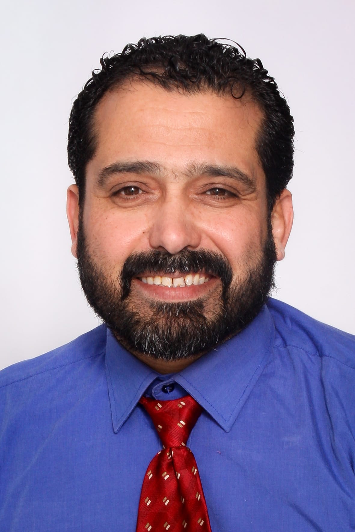 Ali Ettarnichi smiling, Moncton 2026 City Councillor At-Large candidate